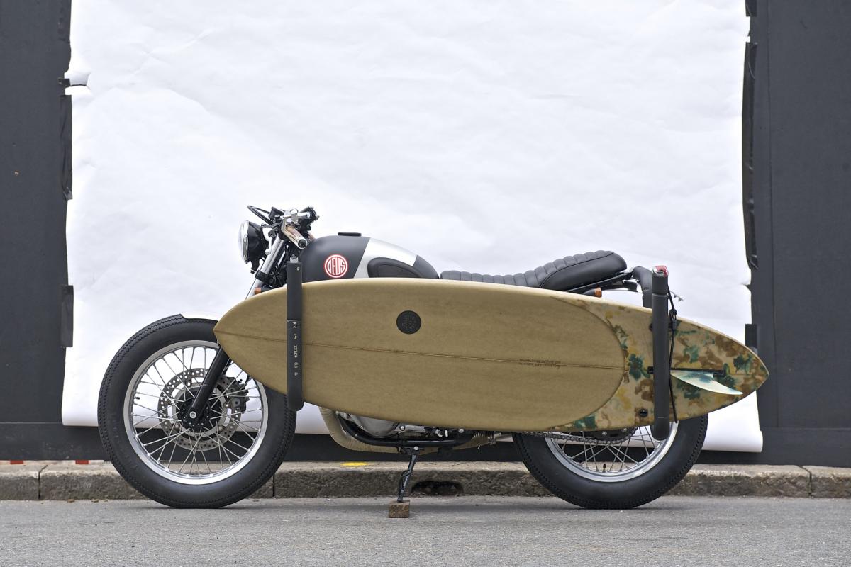 490487-puede-llevar-tabla-surf-moto